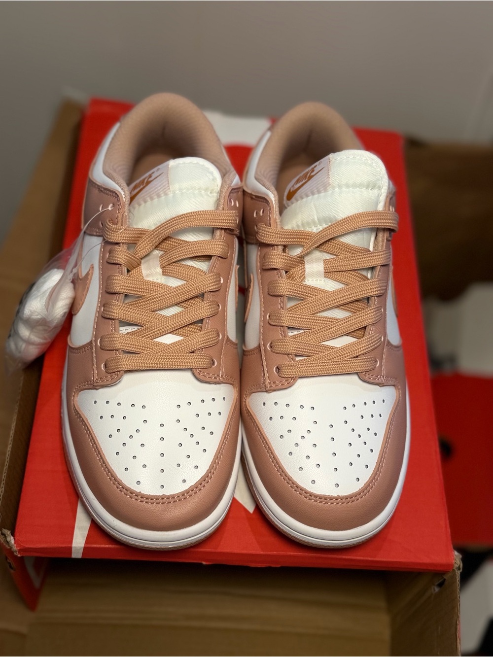 Nike Women’s Low-Top Sneakers in Blush Pink and White